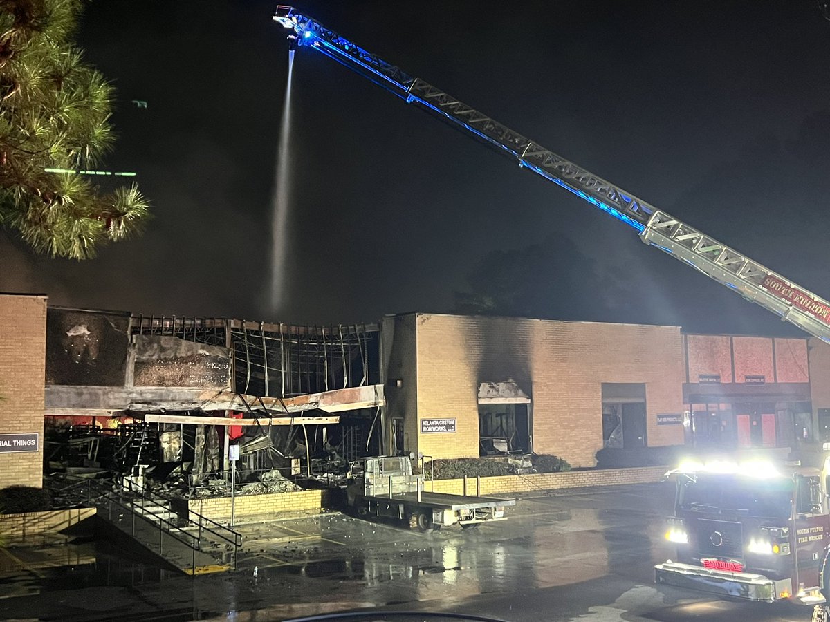 Despite South Fulton and City of Atlanta fire crews getting to this warehouse fire at 2:30 a.m., they're still having to hose down hotspots