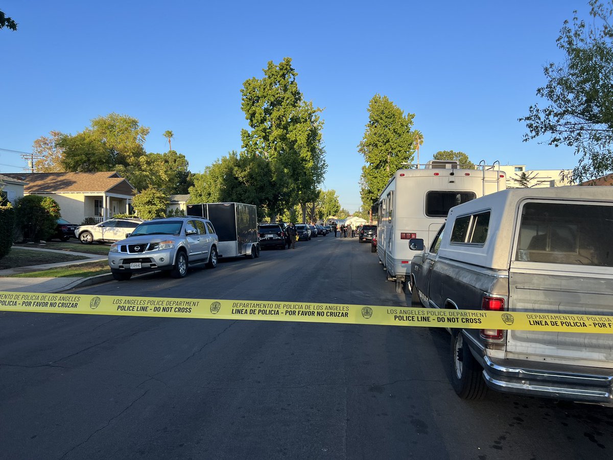 Heavy police presence in this Encino neighborhood. Working to confirm details with police. Neighbors say there was a robbery