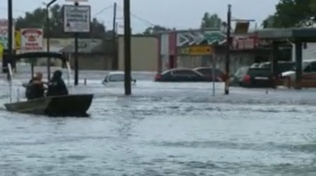 Dozens of people have been rescued from their flooded homes in Ft. Myers, FL