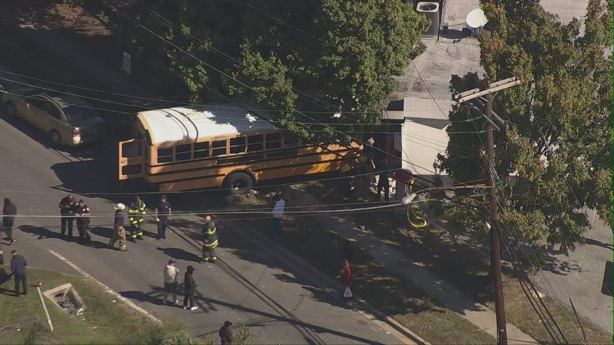 In Forestville Maryland - Forestville Road and Stewart Road, school bus into shell station with partial building collapse, at least one person transported, Chopper4 first on scene