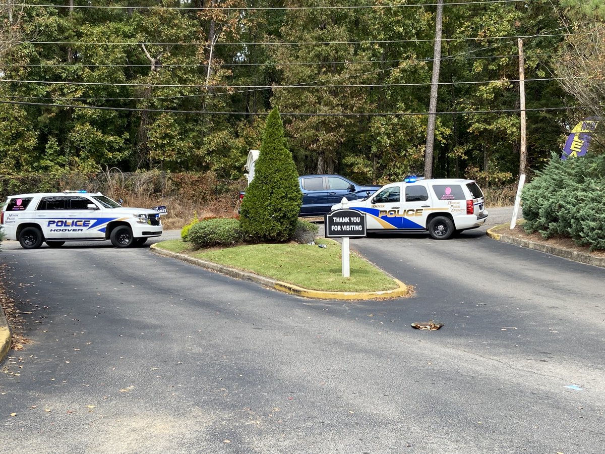 Police have blocked off the entrance to the apartment complex and SWAT officers are still arriving