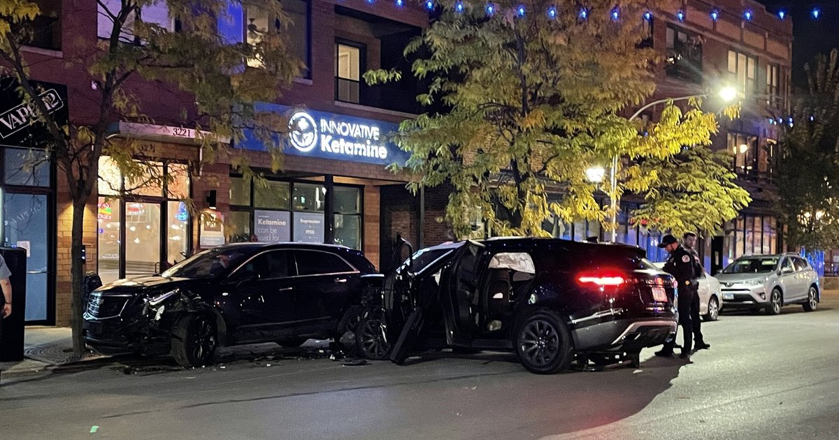 At least one officer injured when SUV hits squad car, parked car in Wrigleyville