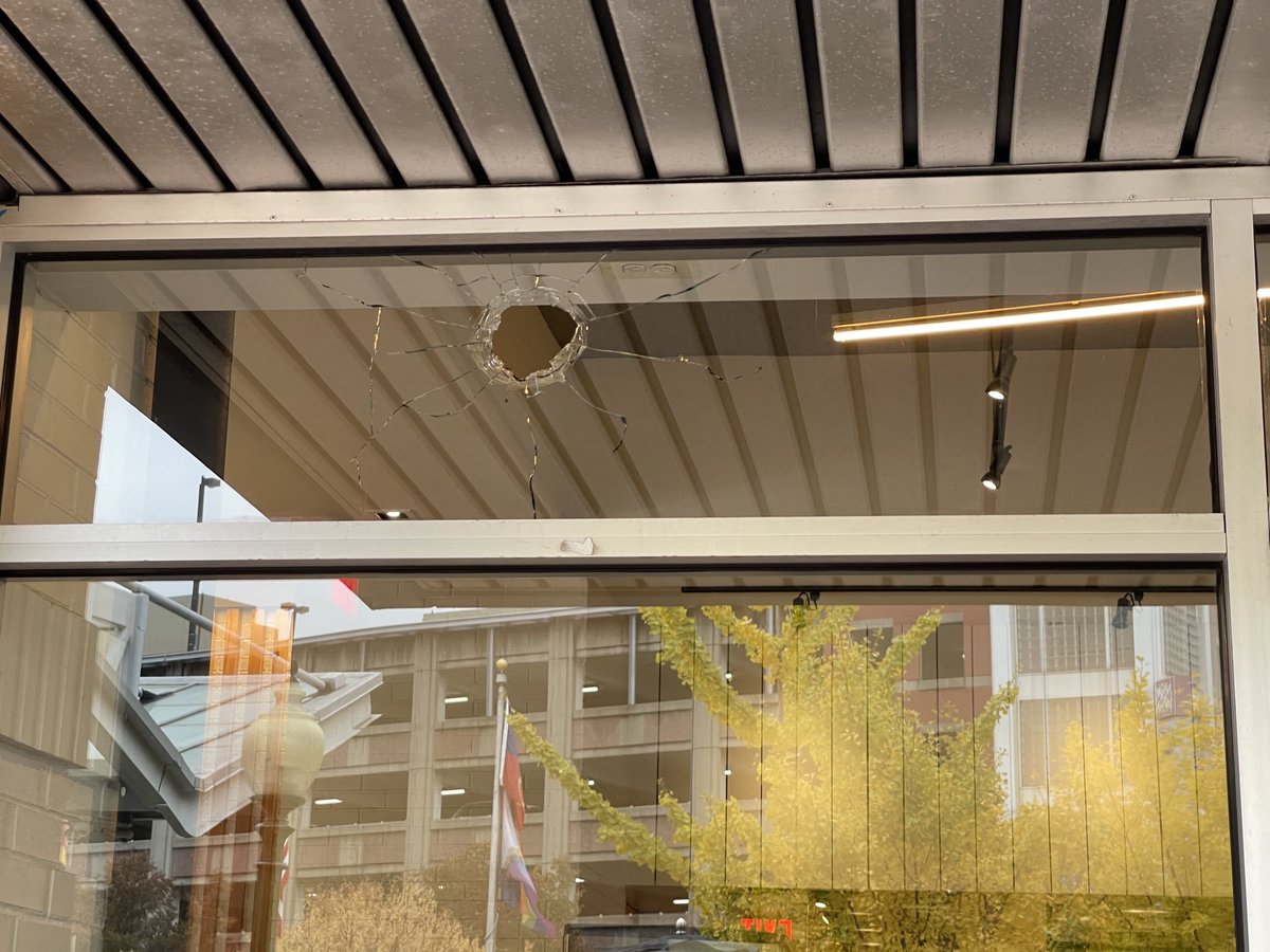 Police find a shell casing in the street on Fenton near where a bullet smashed through a window at the Cava in downtown Silver Spring. One witness tells ⁦@nbcwashington⁩ he saw a man firing a gun over the ice rink while running down Ellsworth. No one hit