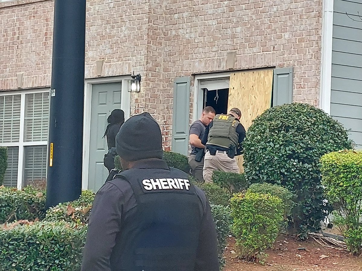 Happening Now. Neighbors described hearing several booms as FBI and Fulton co SWAT make an arrest this morning in South Fulton.