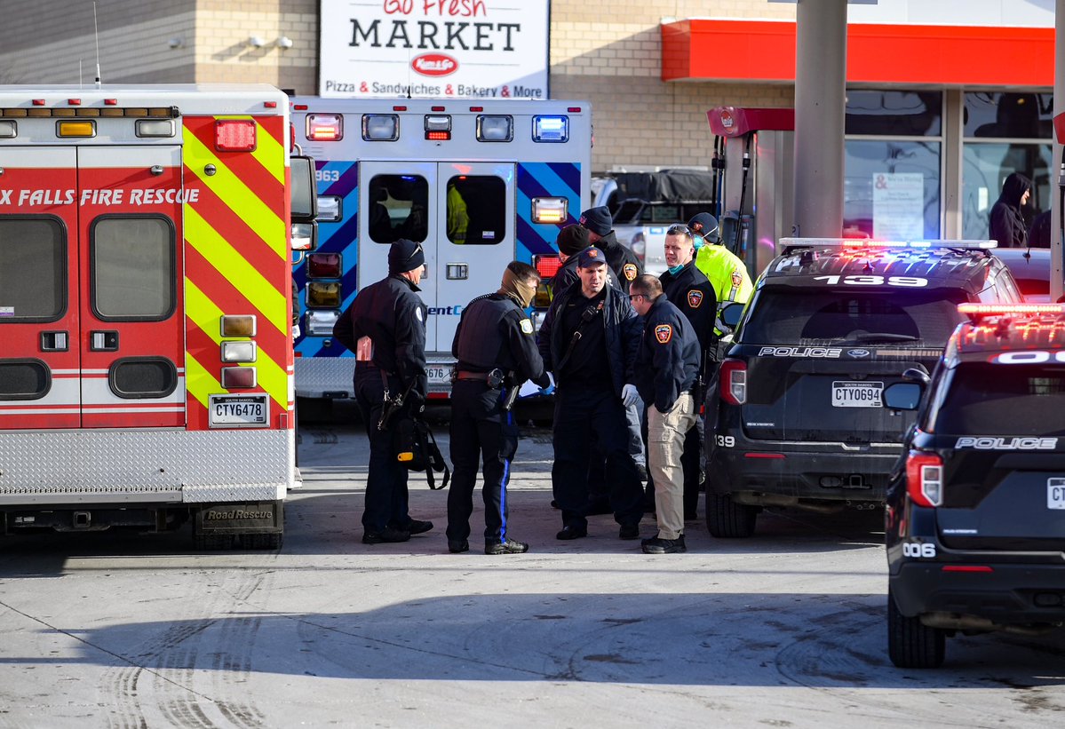 At the scene of a shooting at the Kum and Go on the corner of Minnesota and Russell. Several minutes ago, two ambulances left with lights flashing and sirens on