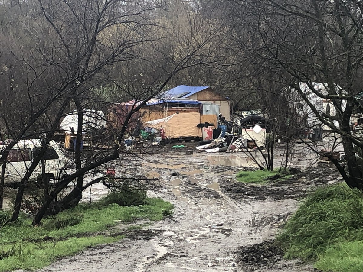 In San José rising flood waters from the Coyote Creek creek ripped through encampments off Corrie Court. Homeless advocates are doing wellness checks and urging people remaining along creek to evacuate