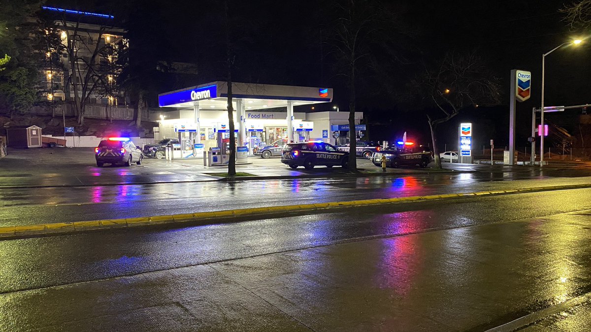 Seattle police are investigating a shooting in the 2100 block of N. Northgate Way with a big presence at a Chevron gas station parking lot.