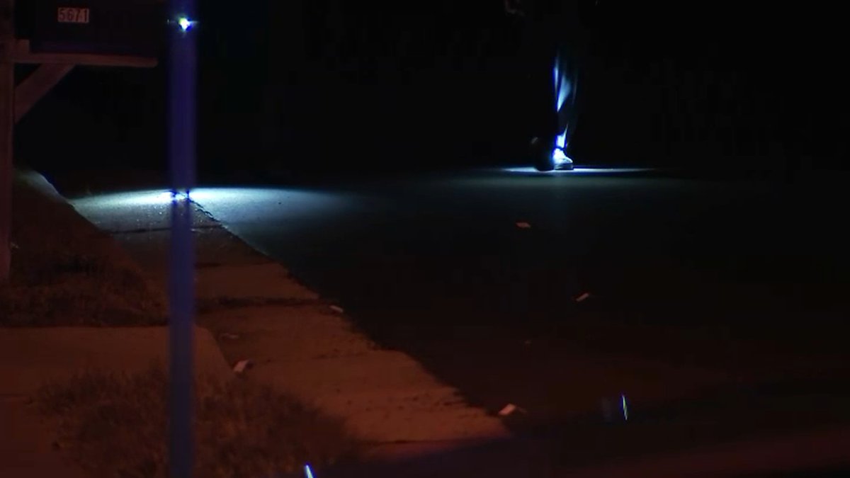 Several bullet markers line Roundtree Drive off Riverside Drive where the shooting occurred. A second teen - who drove the car to the BJ's lot - suffered minor injuries