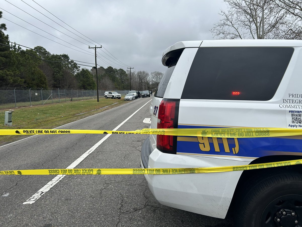 Virginia Beach Police are investigating a suspicious death on Harpers Road, across from Ocean Gate Apartments. Police officers seem to be focused on a red car parked on the road