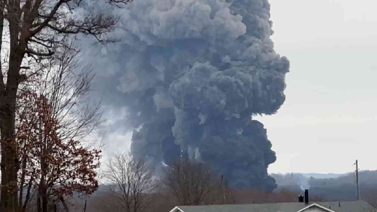 Fire, smoke seen billowing as toxic chemicals released from derailed Ohio tanker cars