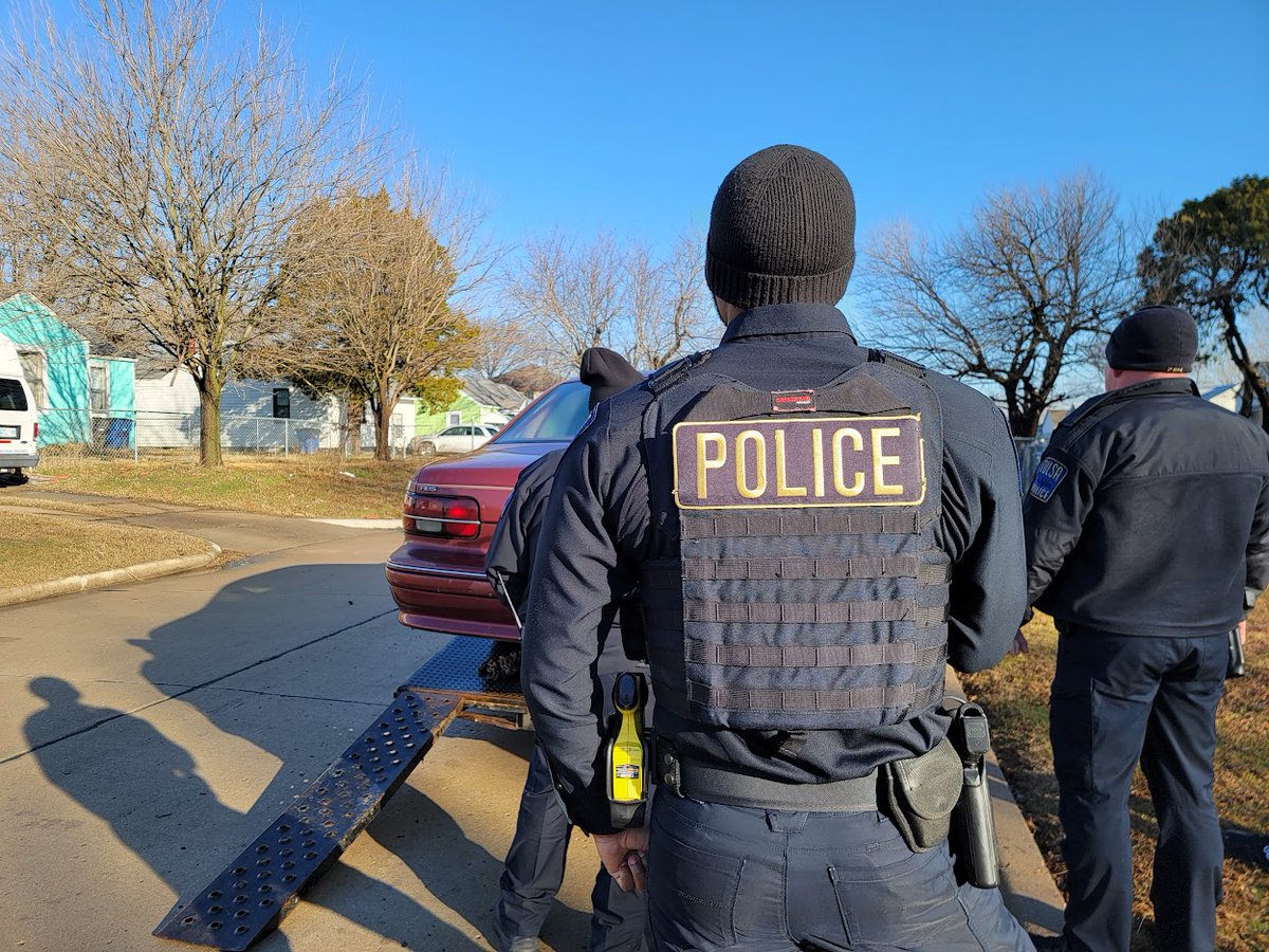 There's a heavy police presence near Apache and Peoria as Officers are working to take a man into custody, believed to be hiding in a house after shooting a woman early this morning