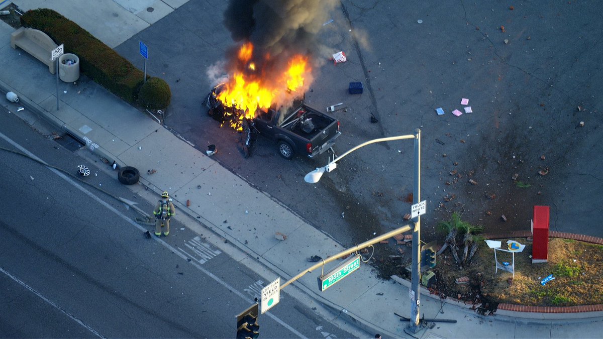 Fire deputies from Lakewood Sheriff Station brave the flames checking for victims. The 2 occupants got out and ran. But caught near by. This all happening in Cerritos at 195th & Pioneer