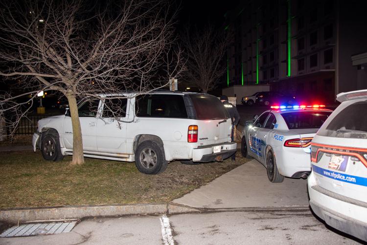 Niagara Falls police took two men into custody Sunday night following an altercation, intentional vehicle collision and shooting incident that began on Niagara Street and spilled onto Rainbow Boulevard
