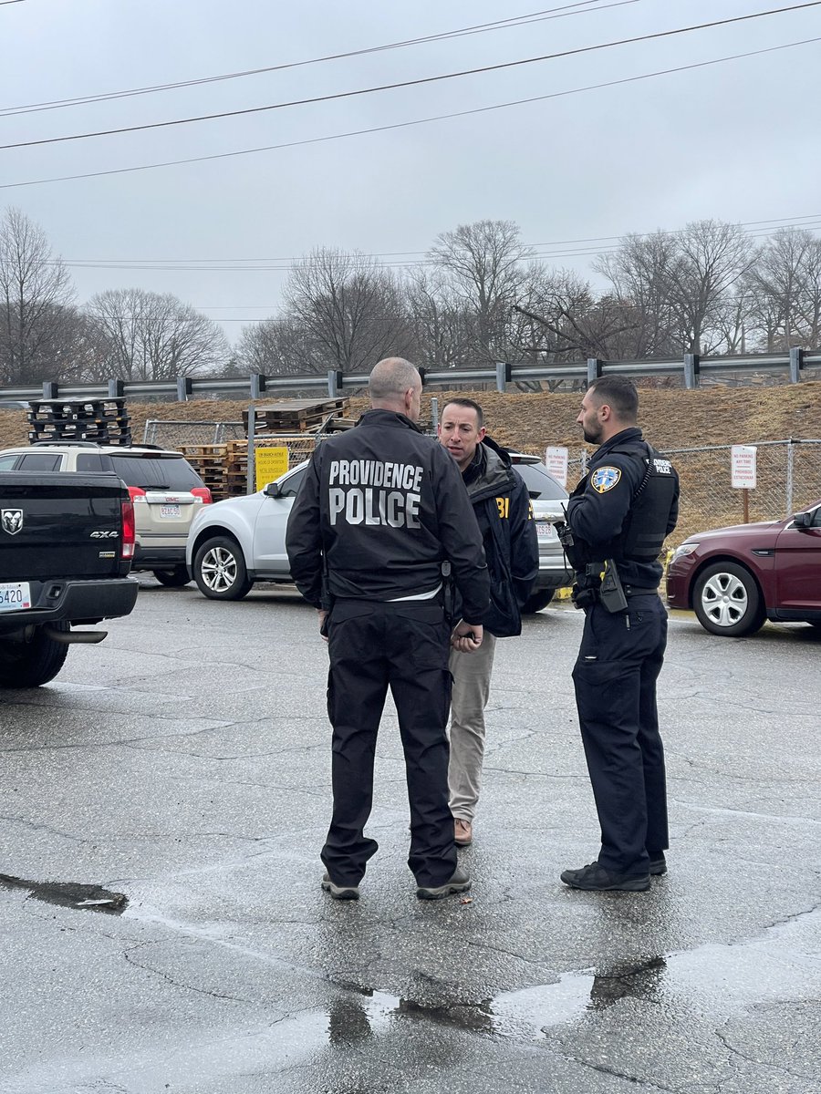 FBI and local law enforcement on scene at the lot next to Savers store on Branch Ave in Providence.