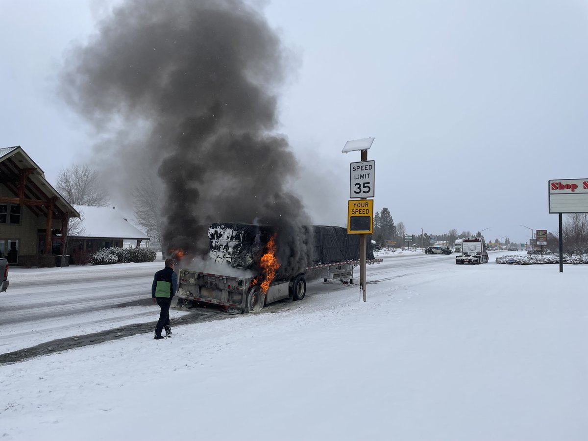 Highway 97 Closed at 6th Street, La Pine.  Emergency crews attempting to extinguish fire on semi-trailer. Expect delays northbound and southbound Highway 97. Oregon State Police investigating cause of fire, ODOT assisting with traffic control
