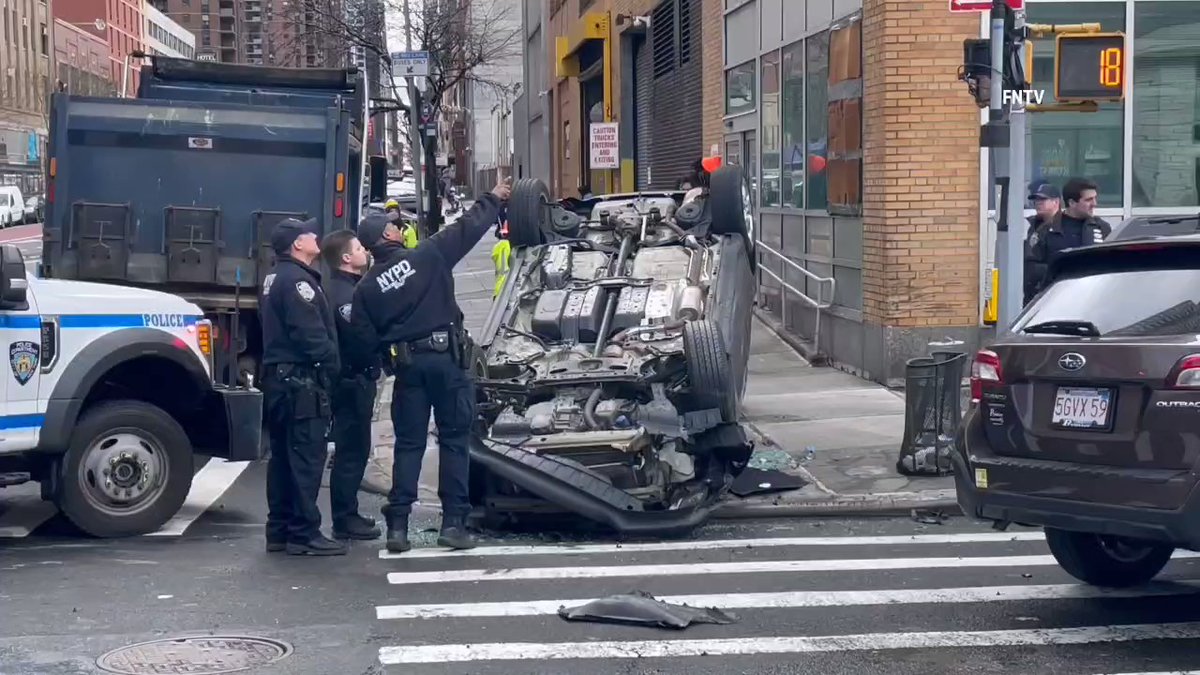 A car flipped upside down onto a busy Midtown sidewalk. Accident happened around 10am on West 42nd Street and 11th Avenue. Car was removed and victim taken in an ambulance