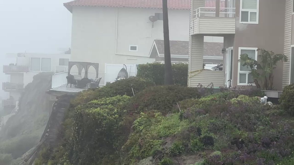 San Clemente landslide.  The patio of an apartment building has slid down the hill. Three buildings side by side are evacuated ⁦