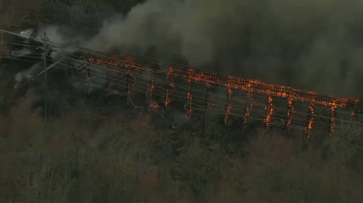 Multiple brush fires burning in NJ . including this one in Matawan that has spread to train tracks that are no longer in use