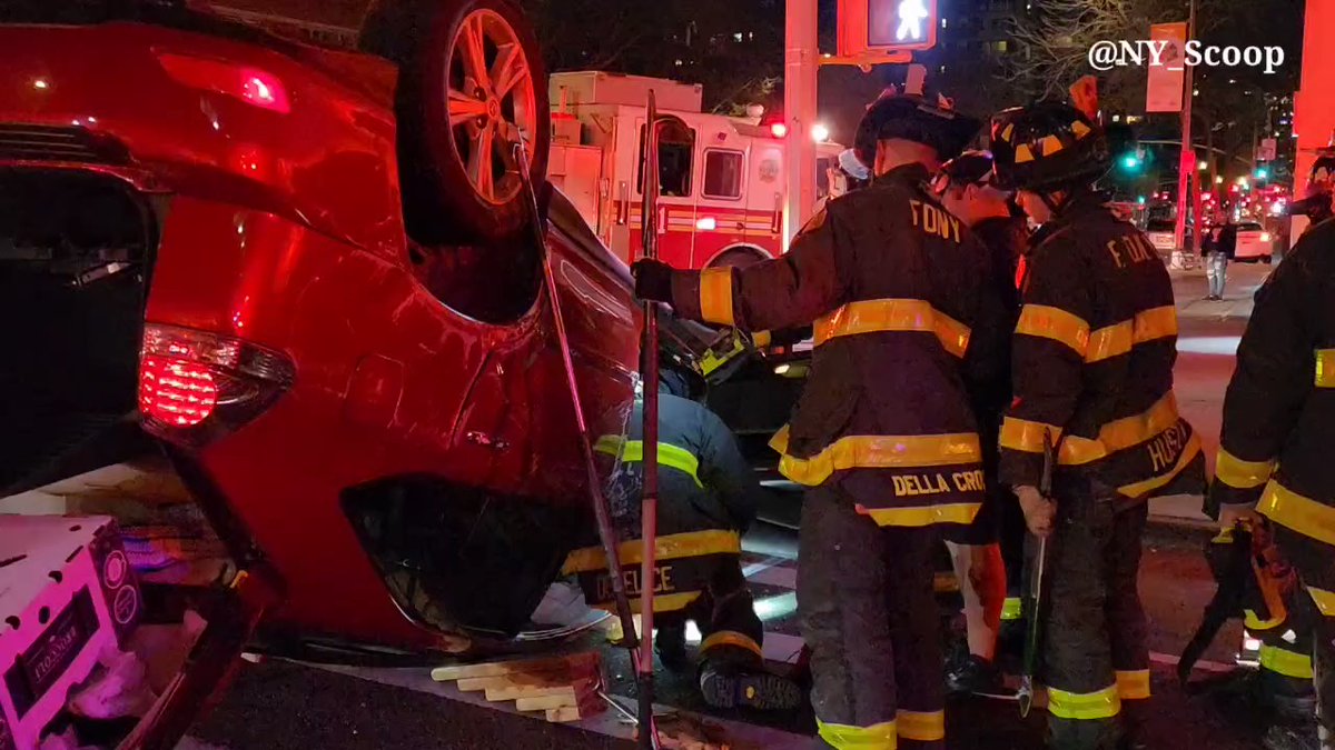 Manhattan: West 29th Street & 9th Avenue, the @FDNY, the @NYPD10Pct, and the @NYPDSpecialops are on the scene of a two-car crash that occurred after the white vehicle blew a red light, crashing into the red vehicle causing it to rollover onto its roof.