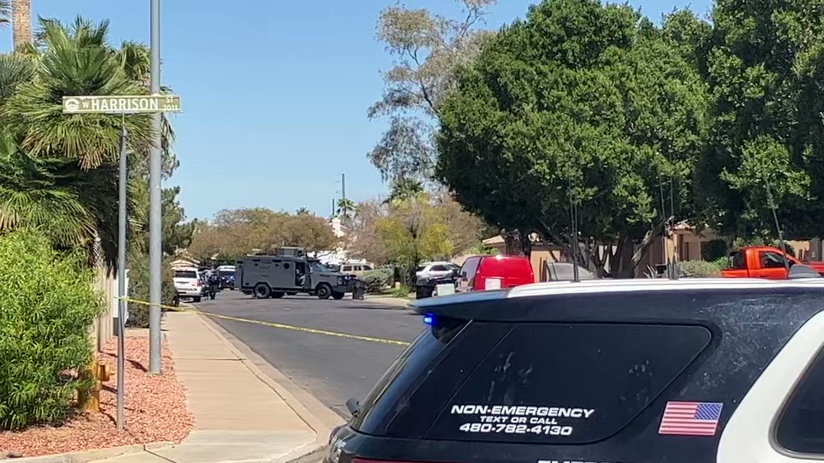 SWAT team members just entered a home where a reported domestic violence shooting happened; shooter is on the loose. Neighbors told to shelter in place while search underway