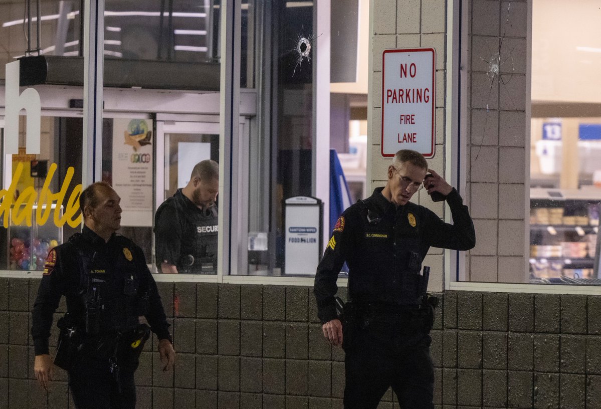 Police are investigating a shooting at the Raleigh Boulevard Shopping Center that occurred around 9 p.m. Monday. At least 50 evidence cones were in the parking lot and at least three bullet holes in the front windows of a Food Lion. Reports of injuries