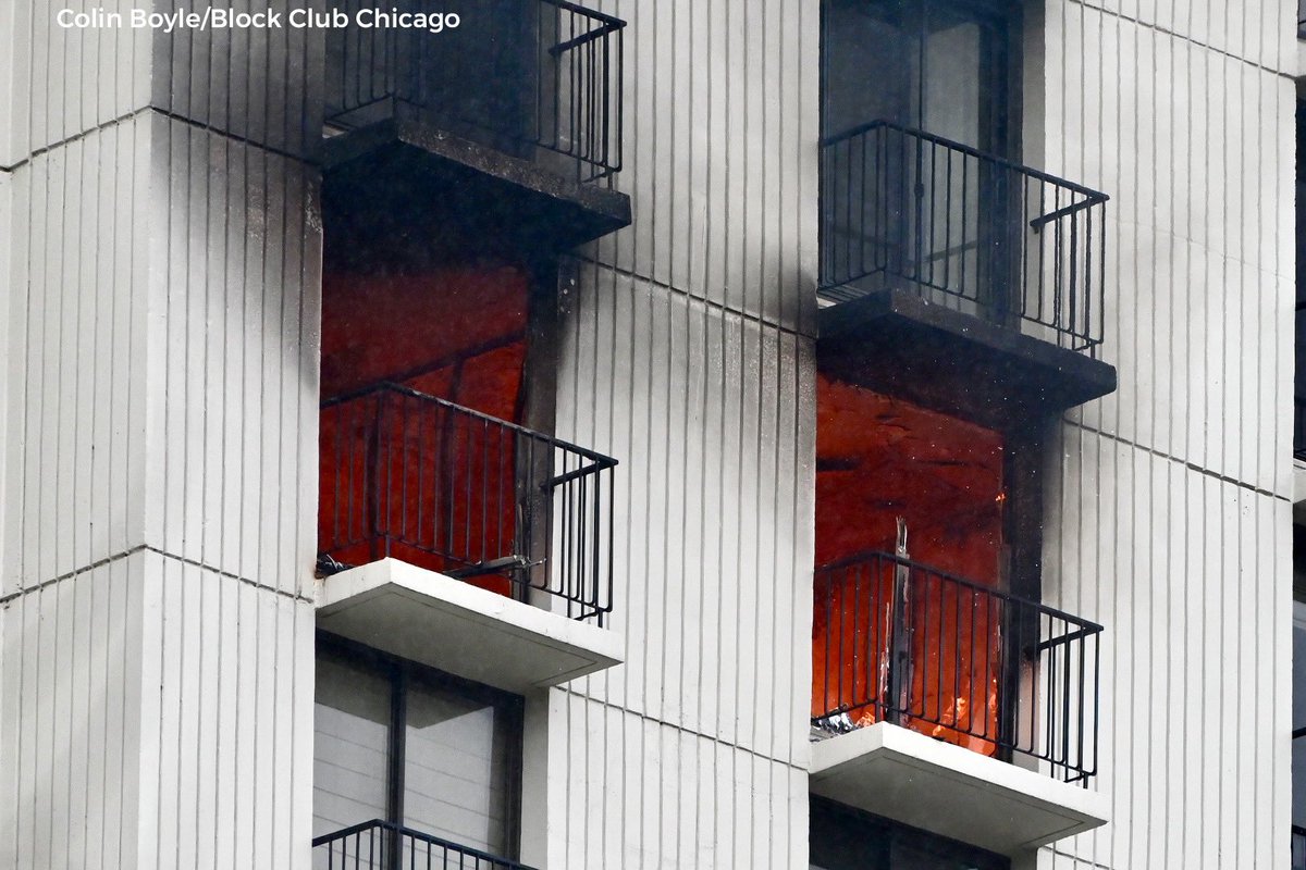 Scene of the 3-11 alarm fire 1212 N Inner Lake Shore Dr.n Flames were still visible and I saw at least one resident standing on a balcony a few floors below. 1 firefighter is reported critical, 1 fair.