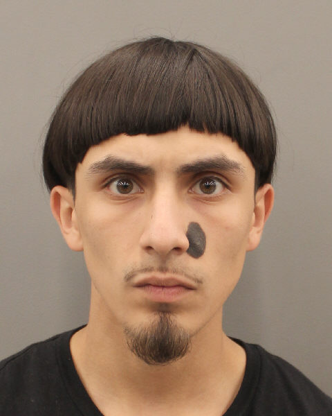 Booking photo of Christopher Pete Santos, 21, now charged with murder in this fatal shooting of a man last night