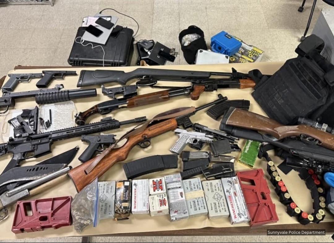 A Sunnyvale couple was arrested with a large stash of weapons, including handguns, shotguns, rifles and a grenade launcher, as well as “several” stolen vehicles, authorities say