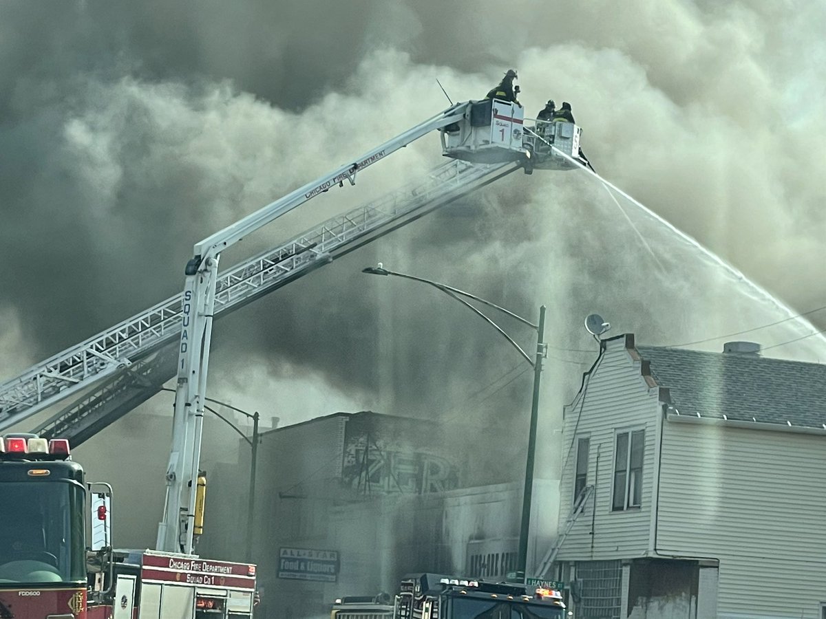 2913 Archer.  Several elevated lines being used to attack this 2 11 alarm fire in a commercial building with exposure issues