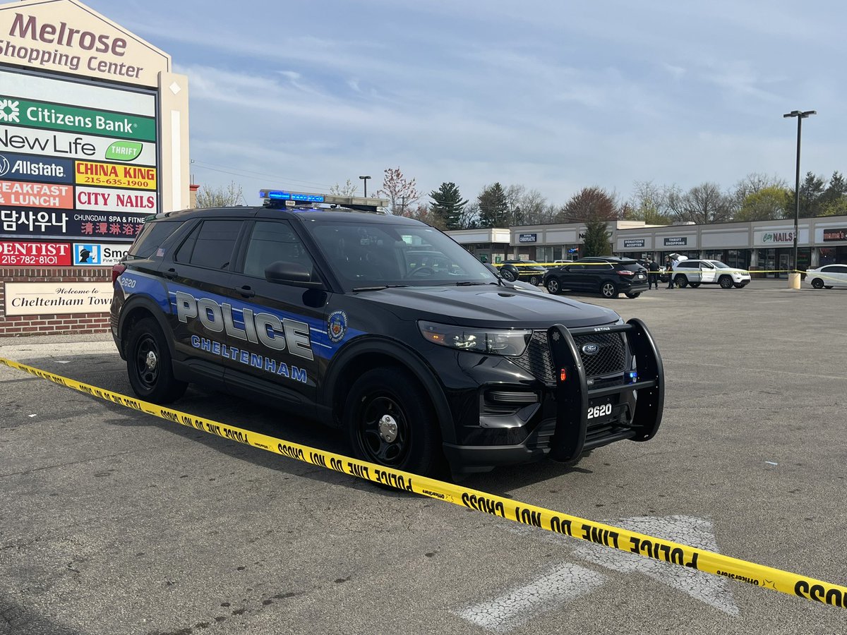 Woman shot and  killed in driver's seat of black Ford SUV in Dunkin' drive thru along Cheltenham Ave  8am.    The SUV went backward up onto an island in the parking lot behind the Dunkin'