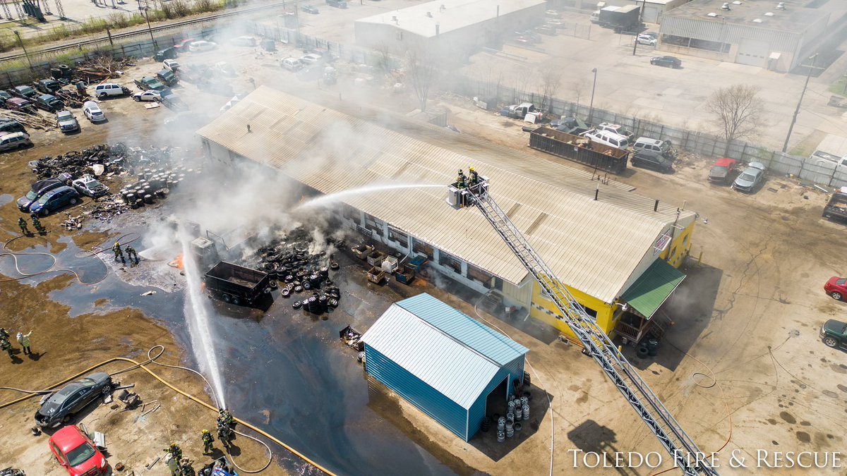 ToledoFire crews remain on scene cleaning up after several vehicles and scrap caught fire ealier today at Rada; Sons Used Auto Parts, 40 E Laskey.