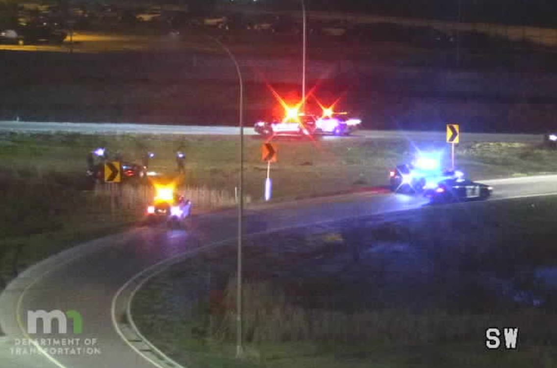 ROSEVILLE: The driver of a black Cadillac who fled from an attempted traffic stop just crashed off southbound I-35W, south of Co. Rd. D. - An officer had the driver and passenger  prone out on the ground at gunpoint before backup arrived
