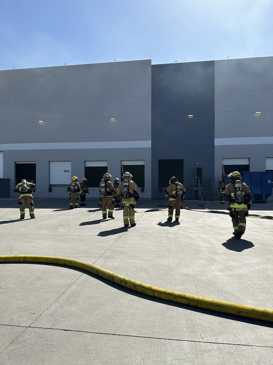 Crews have extinguished an Electrical Vehicle fire that was located inside a commercial building. Firefighters are currently working on extricating the vehicle from the structure. There was no fire extension to building