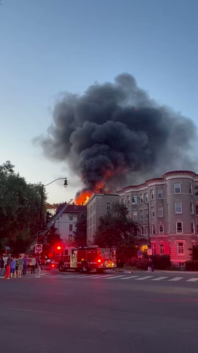 Early video provided by Karla Soptirean shows the ferocity of the roof deck fire in the 2600 block of Adams Mill Rd. NW. DC firefighters