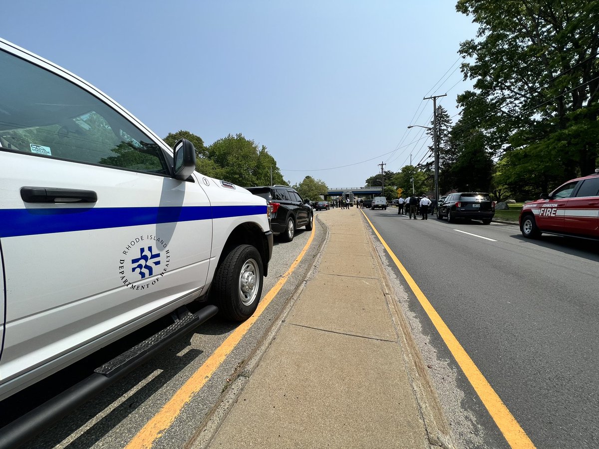 The states Medical Examiners office has just arrived here in Cranston, where police shot and killed the suspect in this mornings triple shooting in Johnston. The suspect pointed a gun at officers after he almost collided with cruisers while they attempted to stop him