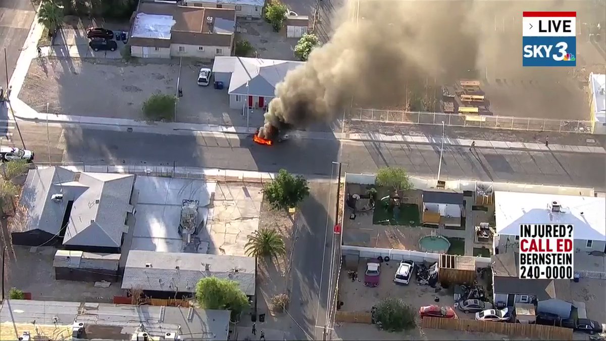 A car fully engulfed in flames in the area of Jackson Avenue and C Street, just north of downtown Las Vegas