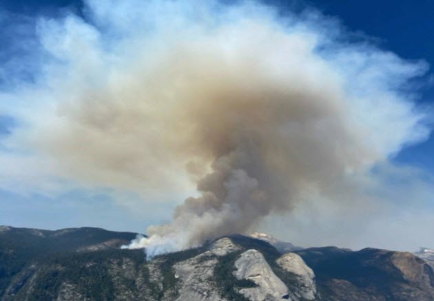Firefighters in Yosemite are working to contain a wildfire near Half Dome that has grown to more than 800 acres, according to fire officials