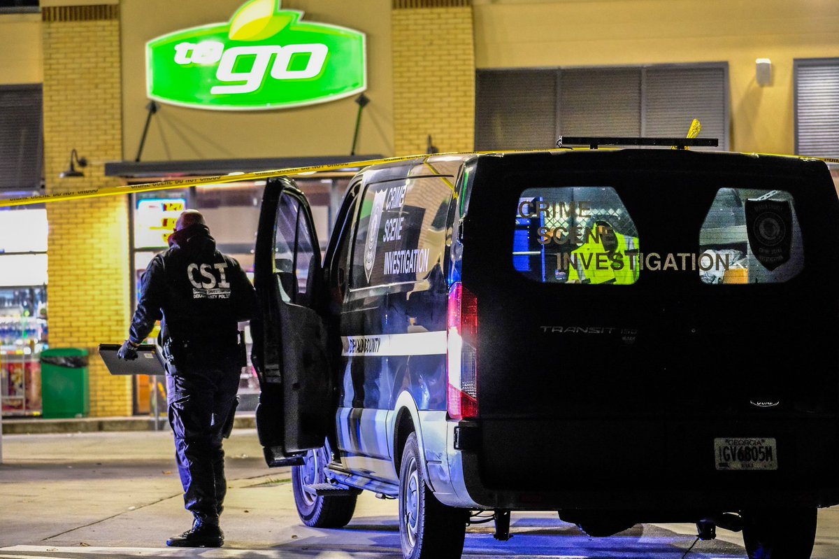 Investigation underway at the BP Gas Station on Flat Shoals Road SE. There's a large @DeKalbCountyPD presence, CSI, and homicide detectives are on scene.