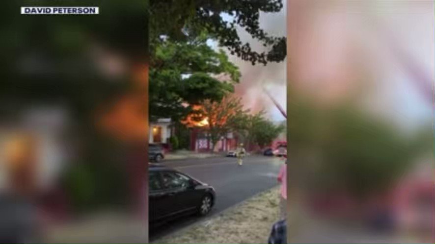 A fire tears through 3 buildings in Tacoma overnight. This video from an eyewitness shows the flames and smoke. Fire investigators are trying to determine a cause