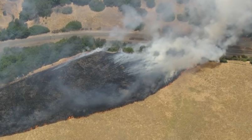 There is a grass fire burning near Cal State East Bay in Hayward. It is near Harder Road at W. Loop Rd.  The fire has burned about five acres.  No evacuations.  Crews are gaining the upper hand
