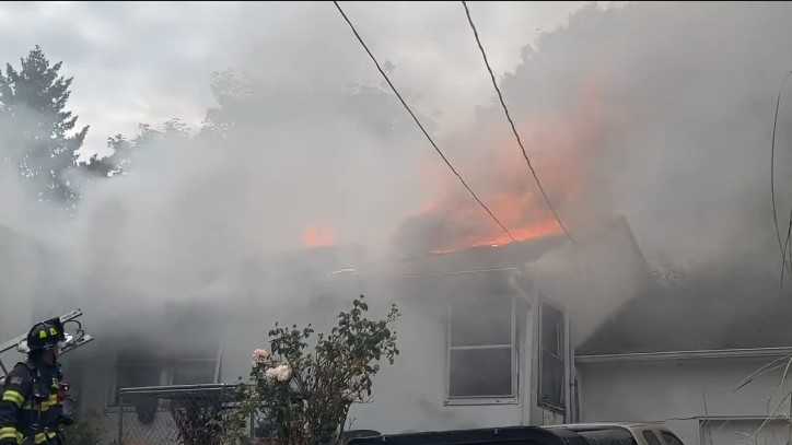 Crews battle  hoarding conditions at Milwaukie house fire