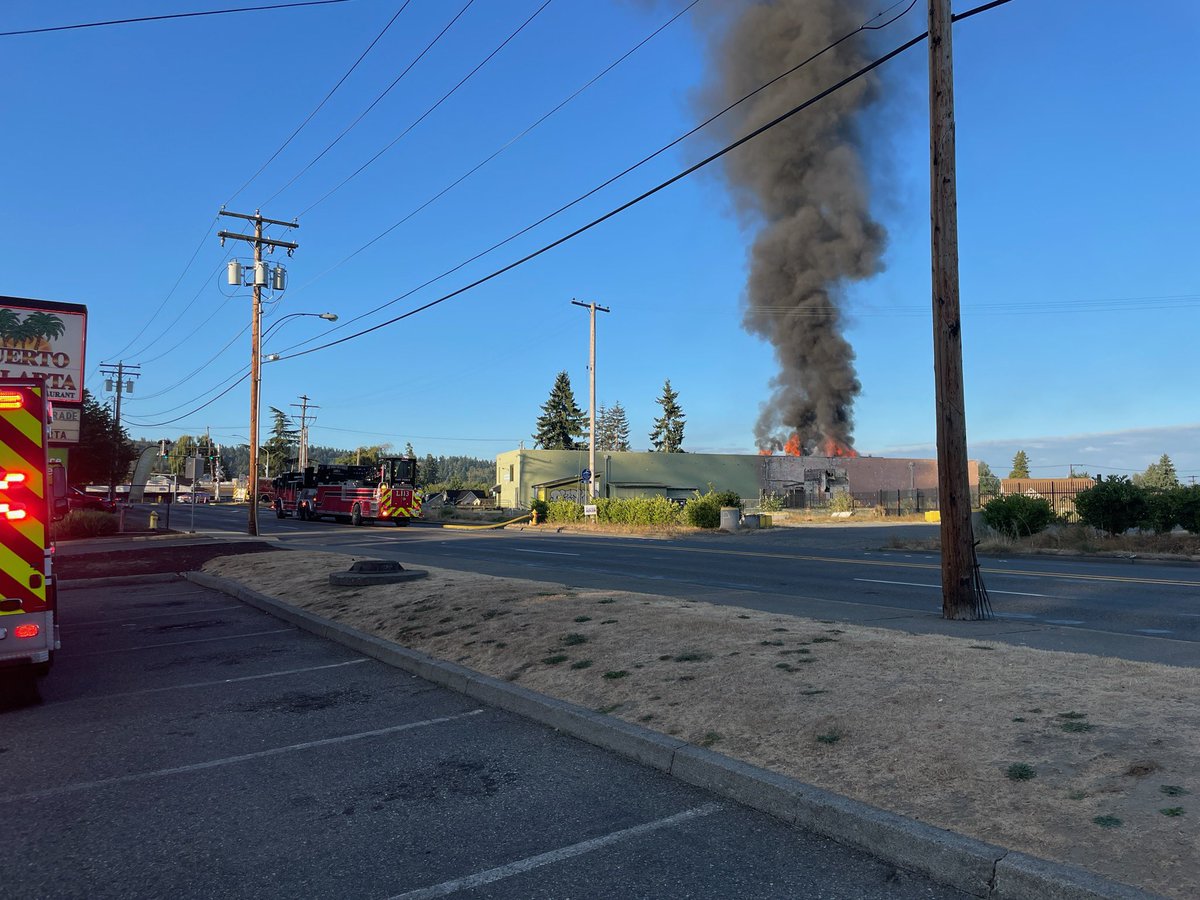 Scene of a commercial fire at the old cold storage facility in the area 15th St SE and East Pioneer. Several road closures in the area. Avoid the area. Fire needs access for responding units. This is now a second alarm commercial fire for Central Pierce Fire