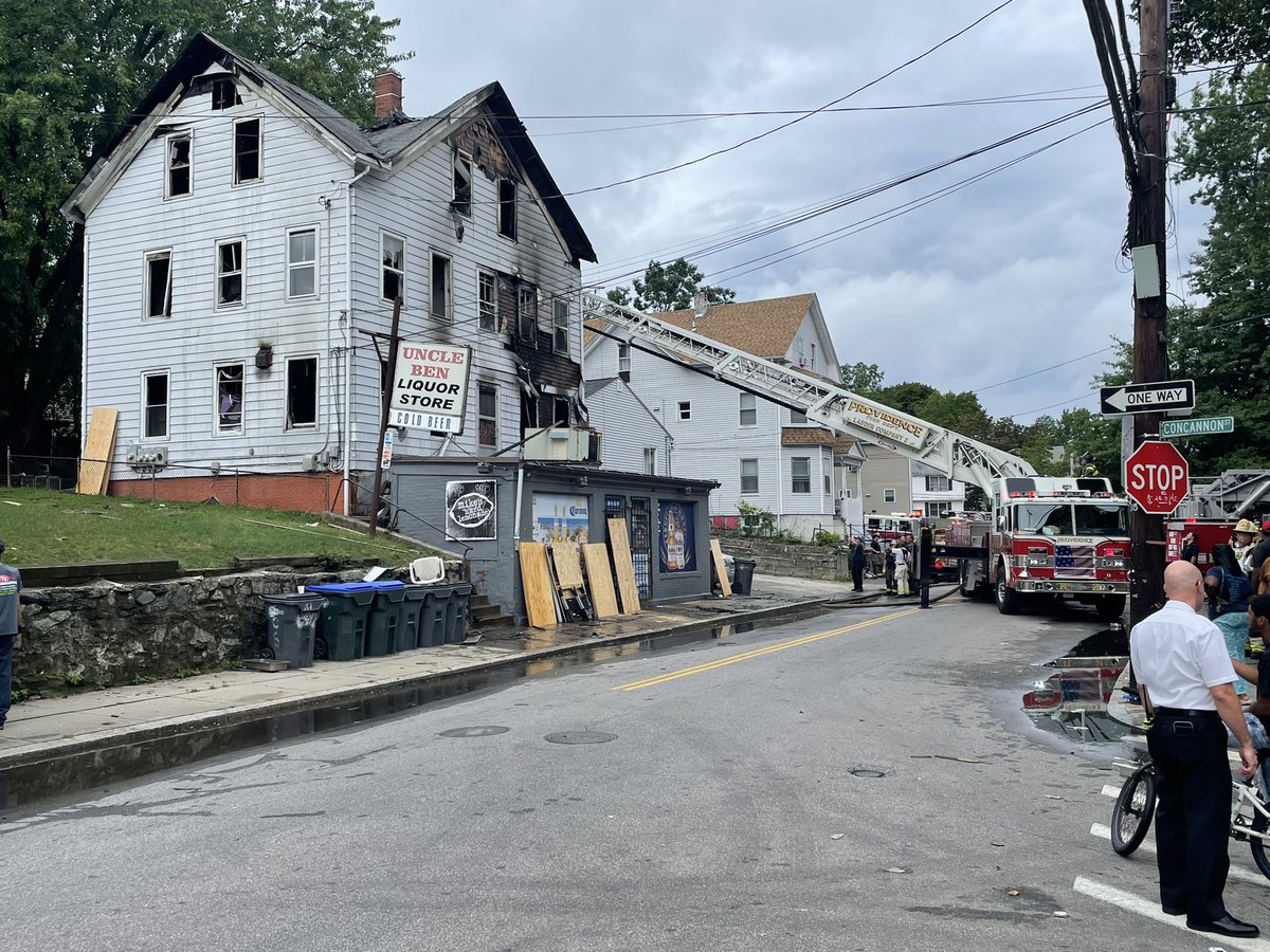 A suspect is in custody charged with arson in connection to a Douglas Ave fire. Two people jumped from the second floor to escape the flames. One has serious injuries. The building above Uncle Ben's Liquors is a total loss