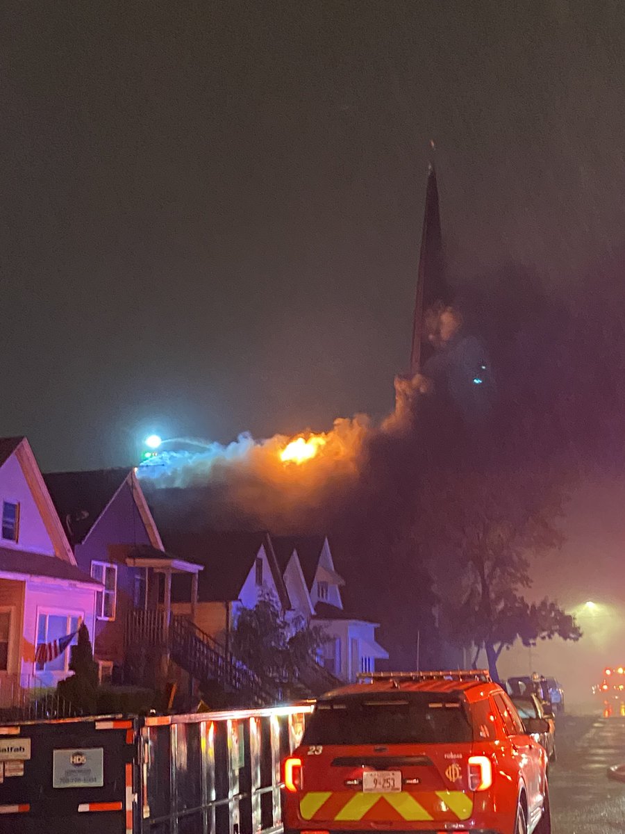 Fire alarm has been escalated to a 2-11, All occupants are out of the building (church) NO injuries reported at this time. A collapse zone has been established due to the integrity of the steeple, homes adjacent have been evacuated as a precaution