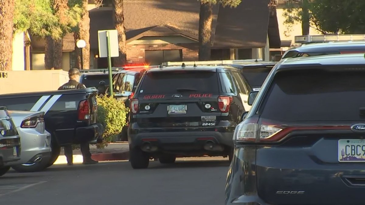 Woman dead, suspect in custody after shooting at Gilbert townhome