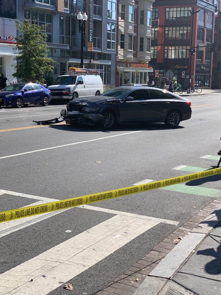 Four-vehicle crash involving a police car and flipped van with 4 injured earlier at 14th and U Street N.W. Onlookers stated that the officer initiated the crash.