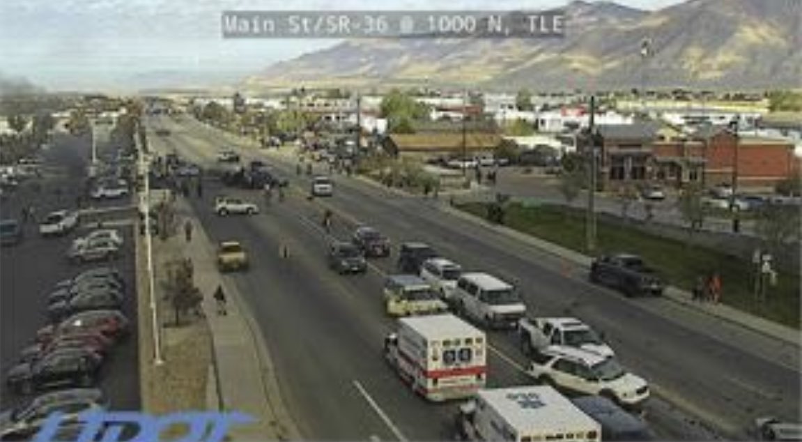 Tooele 1000 N Main St. A semi dump truck possibly lost his brakes and has crashed into multiple vehicles. It continued and crashed into a Dealership where it exploded and has caught multiple vehicles on fire.