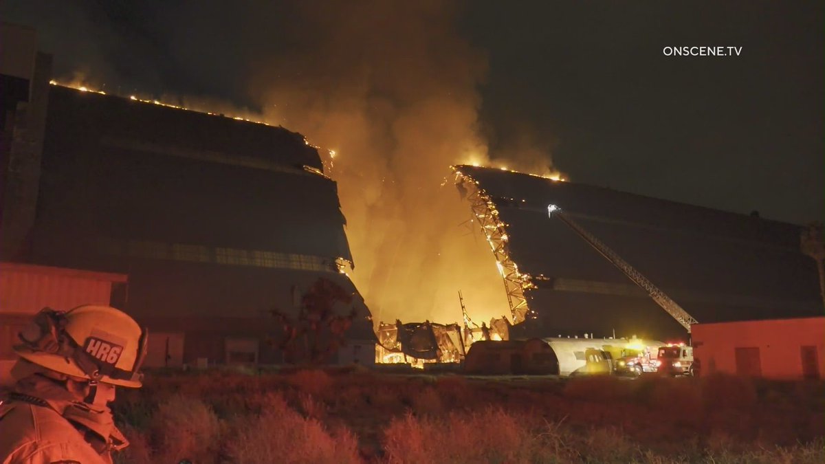 Historic hangar at former air base in Orange County engulfed in flames.