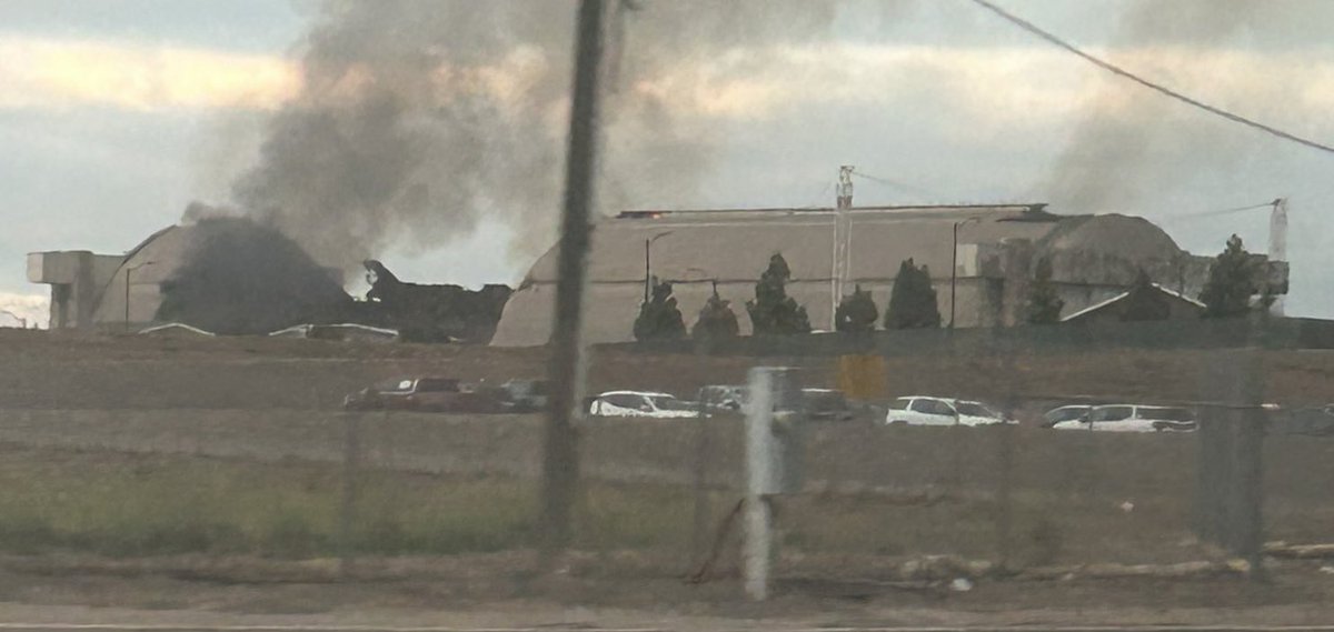 still see the smoke rising up from the blimp hanger here at the old Marine Corps Air Station Tustin.  Firefighters are still on the scene of the 3 alarm fire that began in the 1am hour.  Thx to our tipster Irma Carroll for the pic.