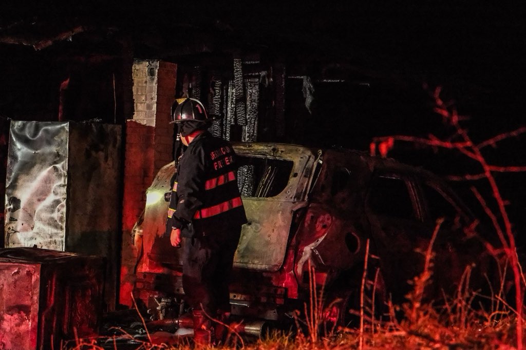 DeKalb Fire Rescue is investigating a house fire on Fair Lane that left a woman in critical condition and killed her two dogs